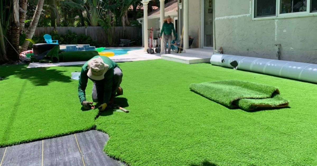 Synthetic turf installation in West Palm Beach by Evergreen Tech showing a lush, low-maintenance green lawn.